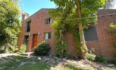 Casa exclusiva con bajada al río en Country Ubajay