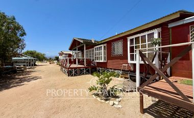Terreno en venta con cabañas en Guanaqueros
