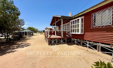 Terreno en venta con cabañas en Guanaqueros