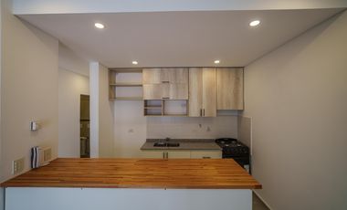 Departamento 3 ambientes planta baja con galeria y parrillla