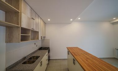 Departamento 3 ambientes planta baja con galeria y parrillla