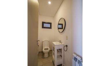 Departamento 3 ambientes planta baja con galeria y parrillla