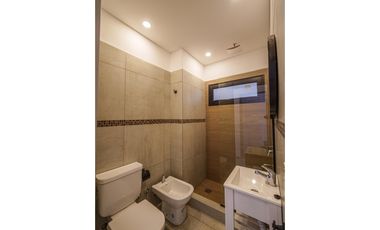 Departamento 3 ambientes planta baja con galeria y parrillla