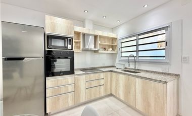 departamento a estrenar 2 ambientes en venta en lujan centro con patio y cochera