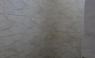 Casa sobre dos terrenos