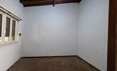 Casa sobre dos terrenos