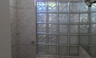 Casa sobre dos terrenos