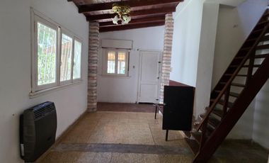 Casa sobre dos terrenos