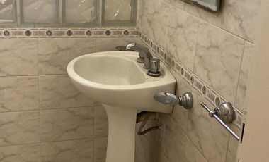 Casa sobre dos terrenos