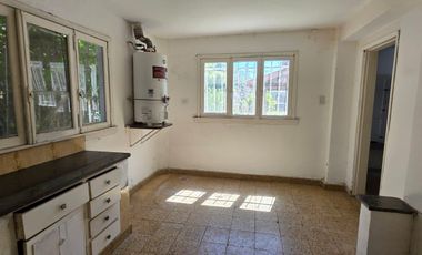 Casa sobre dos terrenos