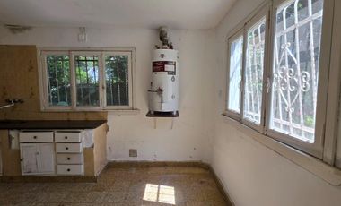 Casa sobre dos terrenos