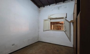 Casa sobre dos terrenos