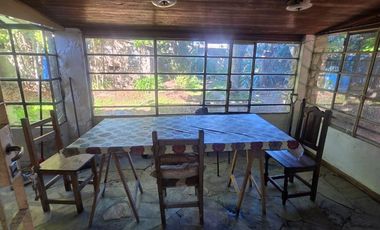 Casa sobre dos terrenos