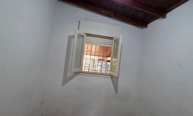 Casa sobre dos terrenos
