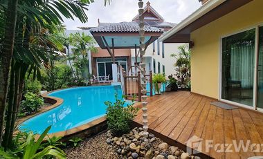 Lanna style pool villa with garden