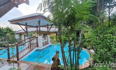 Lanna style pool villa with garden