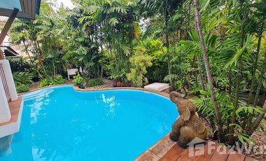 Lanna style pool villa with garden