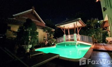 Lanna style pool villa with garden