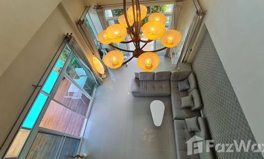 Lanna style pool villa with garden