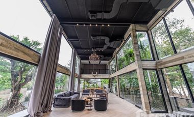 Live in Luxury at This Quiet, Refined Taweesook Villa