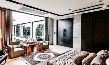 Live in Luxury at This Quiet, Refined Taweesook Villa