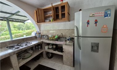 VENTA ESPECTACULAR CASA FINCA UBICADA  A 10 MINUTOS DE LA VEGA C/MARCA