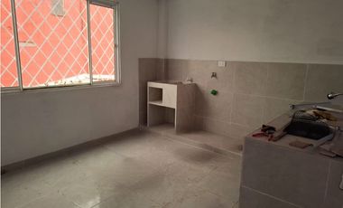 BODEGA-PARQUEADERO CON APARTAMENTOS VILLAVICENCIO