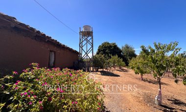 Gran campo con casa