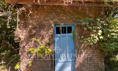 Gran casa patrimonial con lindos jardines