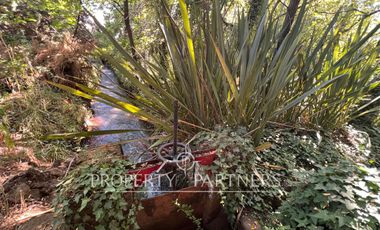 Gran casa patrimonial con lindos jardines