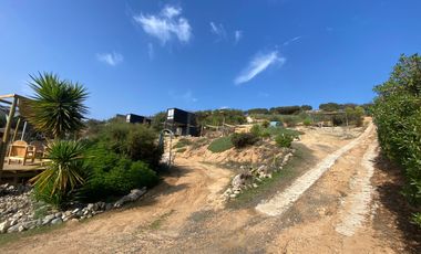 SE VENDE HERMOSA PARCELA CON 3 CABAÑAS EQUIPADAS