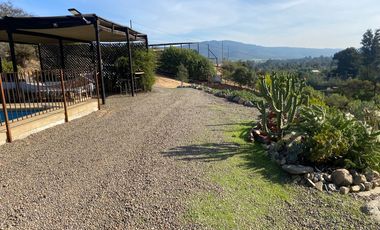 SE VENDE HERMOSA PARCELA CON 3 CABAÑAS EQUIPADAS