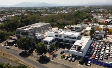 LOCAL 25 Y 26 CON TERRAZA EN RENTA PLAZA LA JOYA