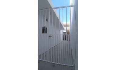 Departamento de dos dormitorios con patio y asador en alquiler