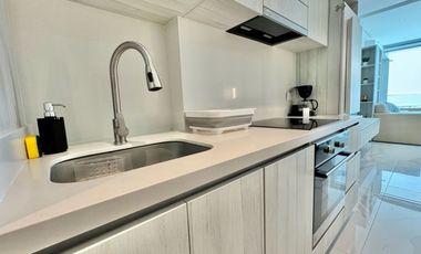 Aparta suite en venta a media cuadra de la playa Del Hotel Hilton