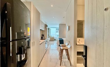 Aparta suite en venta a media cuadra de la playa Del Hotel Hilton