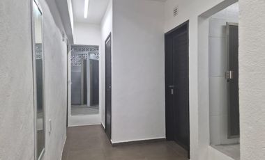 Oportunidad Única en Playa del Carmen: Edificio Comercial con Hostal y Roof Top Bar