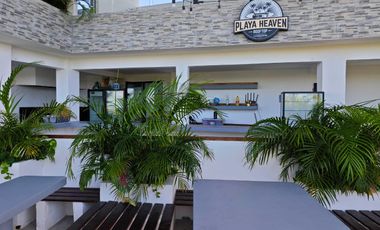 Oportunidad Única en Playa del Carmen: Edificio Comercial con Hostal y Roof Top Bar