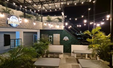 Oportunidad Única en Playa del Carmen: Edificio Comercial con Hostal y Roof Top Bar