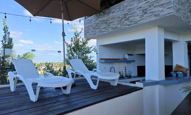 Oportunidad Única en Playa del Carmen: Edificio Comercial con Hostal y Roof Top Bar