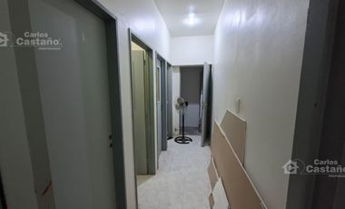 Casa con gran potencial y múltiples espacios profesionales.