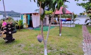 CASA DE CAMPO AMPLIO TERRENO FRENTE AL RIO TUXPAN.