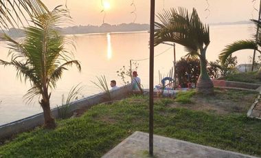 CASA DE CAMPO AMPLIO TERRENO FRENTE AL RIO TUXPAN.