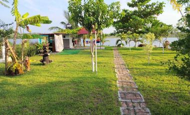 CASA DE CAMPO AMPLIO TERRENO FRENTE AL RIO TUXPAN.