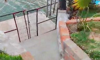 CASA DE CAMPO AMPLIO TERRENO FRENTE AL RIO TUXPAN.
