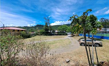 VENDO LOTE DE 1100M2 TITULADO COLINDANTE CON RIO CALDERA