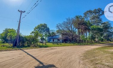 Oportunidad Terreno en Libertador Esquina Corrientes. 16 hectareas y casa de campo