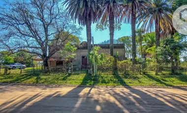 Oportunidad Terreno en Libertador Esquina Corrientes. 16 hectareas y casa de campo