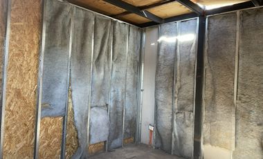 Proyecto de construcción de un hostal que está inconcluso.