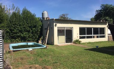 Casa en  Laguna de lobos con parque, quincho y pileta. Oportunidad